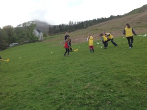 Eigg and Muck playing hockey 
